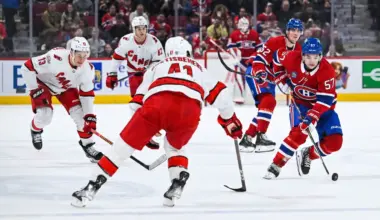 Montreal Canadiens center Sean Farrell (57) plays the puck against Carolina Hurricanes defenseman Shayne Gostisbehere (41) during the first period at Bell Centre.
