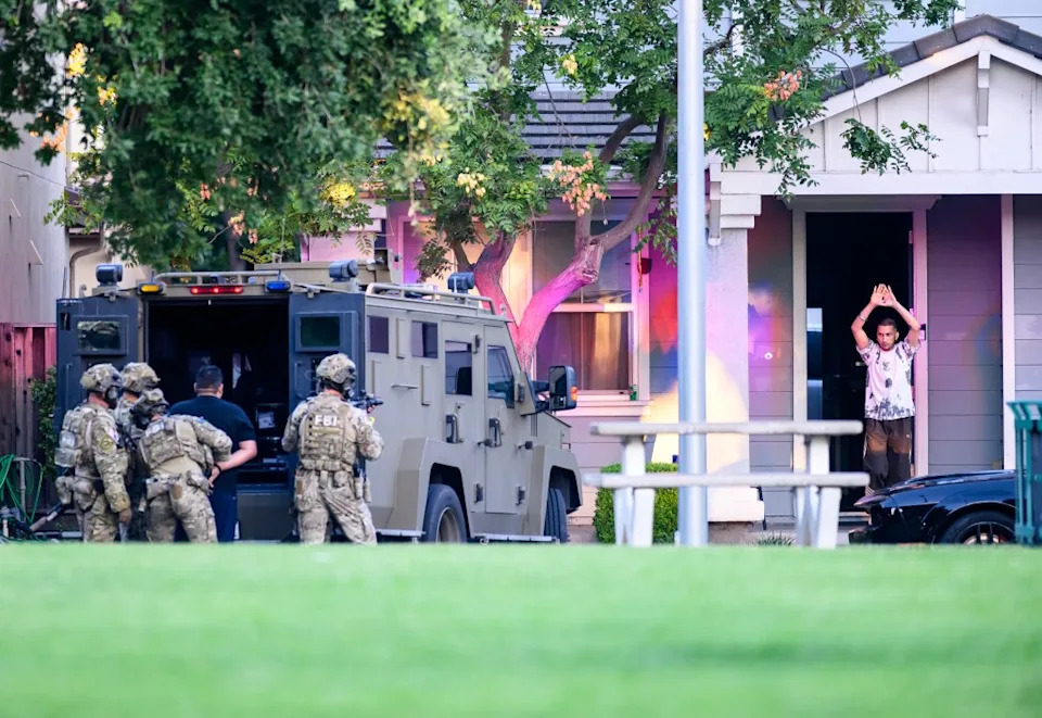 Federal agents raid a home in Stockton, Calif. CA Post