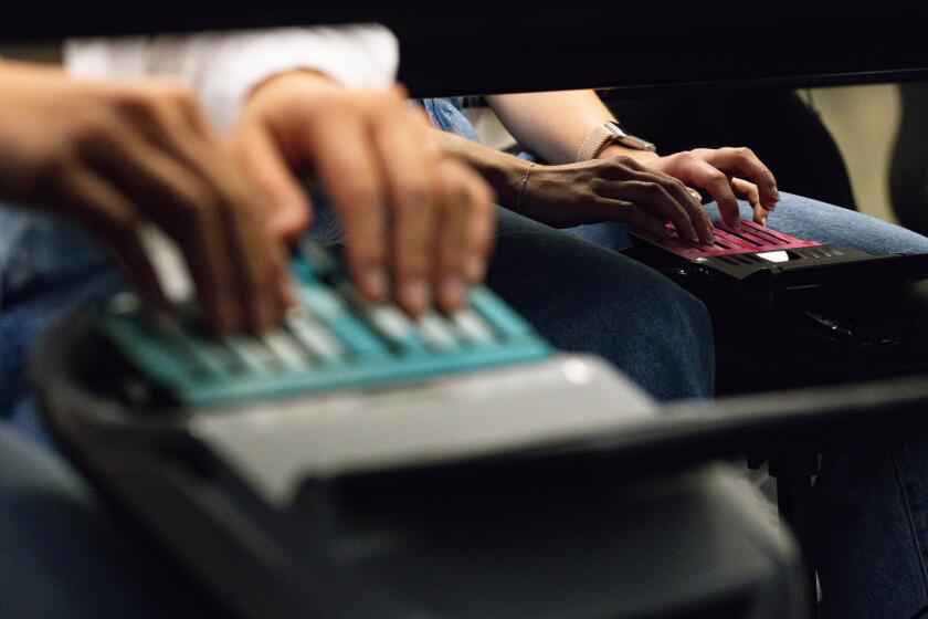 Humans, machines or nothing: Case will decide future of California court transcripts