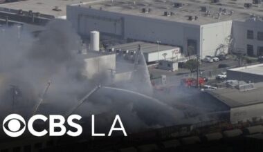 LA County firefighters extinguish flames burning Vernon warehouse
