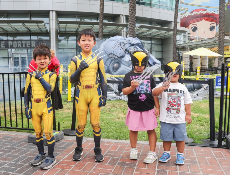 Four children in Wolverine costumes