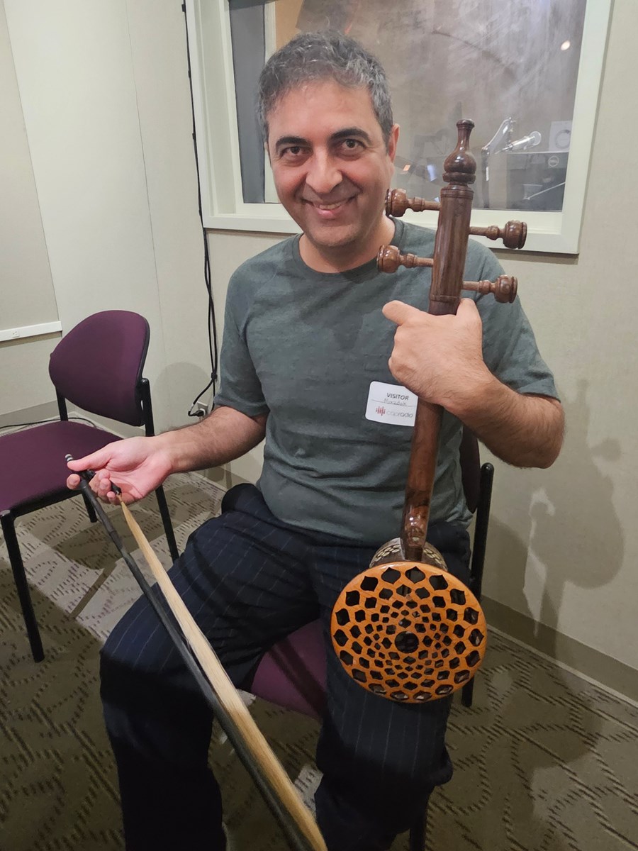 Mazdak Alipour plays a Lorestani version of a string instrument known as the Kamancheh, which has an open back for better amplification.