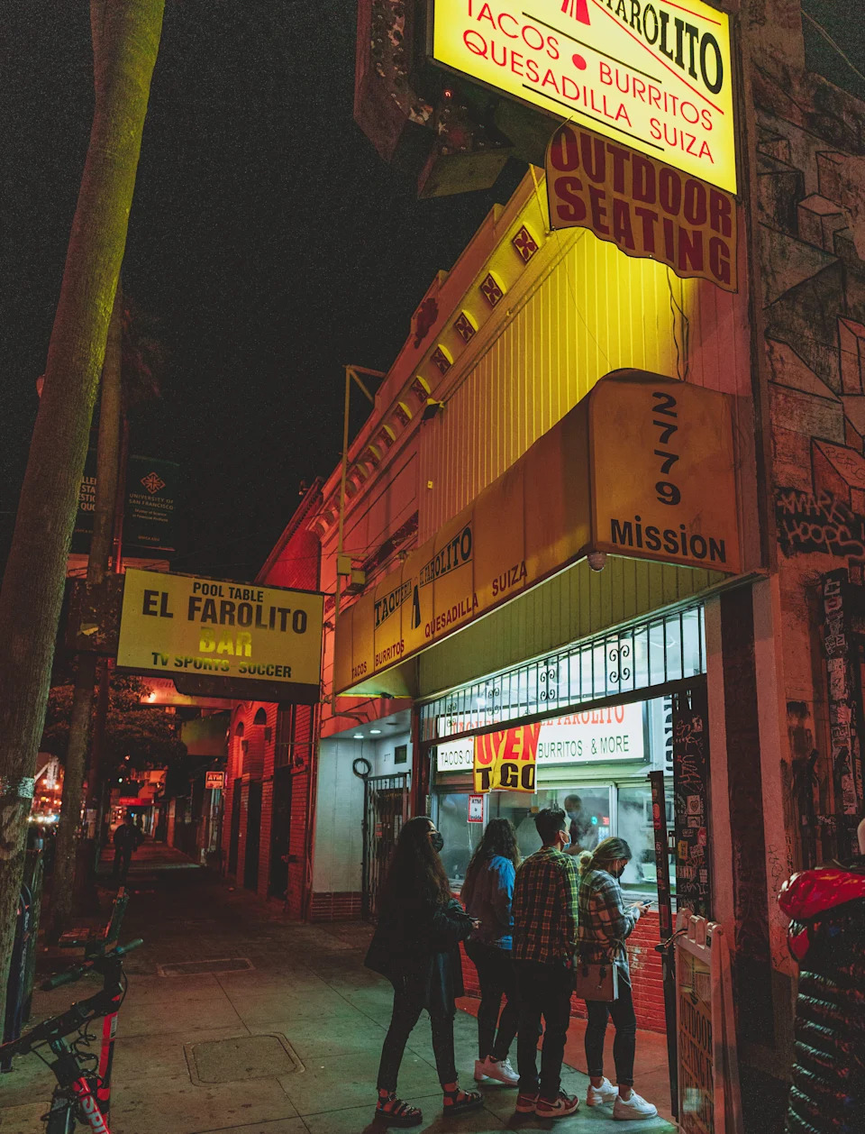 People waiting for burritos at El Farolito in San Francisco