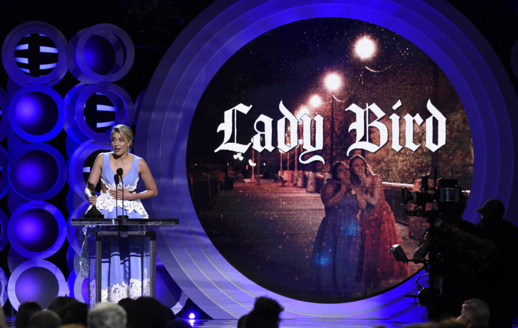 Greta Gerwig accepts an award