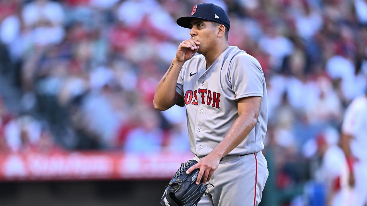 Boston Red Sox pitcher Ranger Suarez walks back to the dugout after the first inning of a baseball game against the Los Angeles Angels, Sunday, July 5, 2026, in Anaheim, Calif. (AP Photo/William Liang)