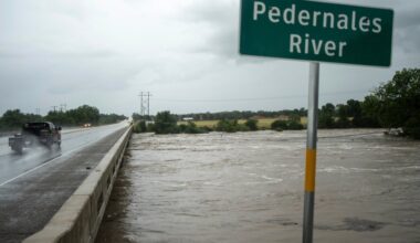 Texas flooding surges as rescuers pull people from rising waters
