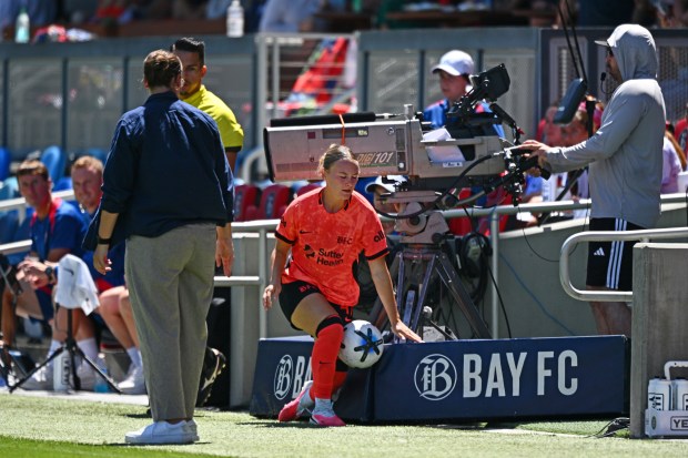 Bay FC's Alex Pfeiffer (17) crashes into a television camera while chasing down an out of bounds ball while playing the North Carolina Courages during the second half of their match at PayPal Park in San Jose, Calif., on Saturday, July 17, 2026. Bay FC defeated North Carolina 3-0. (Jose Carlos Fajardo/Bay Area News Group)