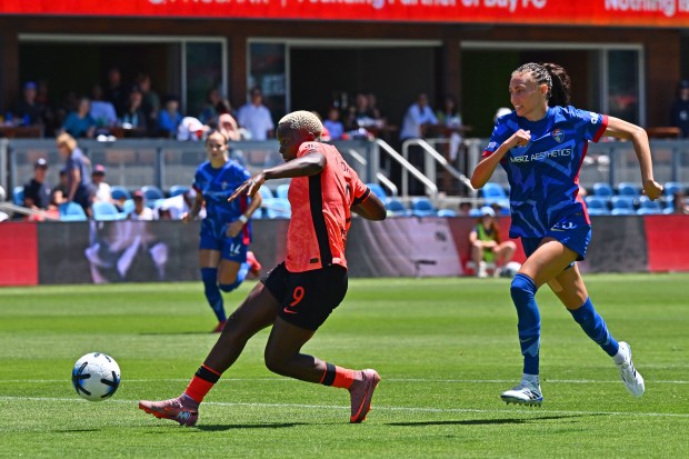 Bay FC's Racheal Kundananji (9) shoots and scores past North Carolina Courage's Maycee Bell (25) during the second half of their match at PayPal Park in San Jose, Calif., on Saturday, July 17, 2026. Bay FC defeated North Carolina 3-0. (Jose Carlos Fajardo/Bay Area News Group)