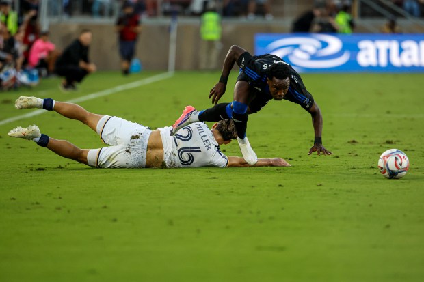 San Jose Earthquakes' Jamar Ricketts (2) falls towards the ball against LA Galaxy's Harbor Miller (26) in the first half at Stanford Stadium in Stanford, Calif., on Saturday, July 25, 2026.  (Shae Hammond/Bay Area News Group)