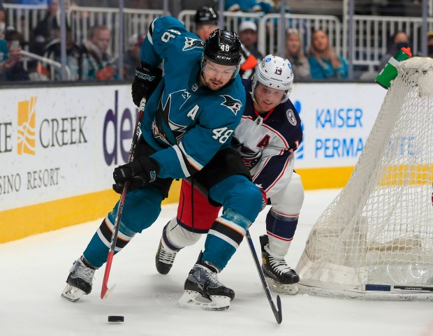 SAN JOSE, CALIFORNIA - APRIL 19: San Jose Sharks' Tomas Hertl (48) controls the puck against Columbus Blue Jackets' Zach Werenski (8) in the third period at the SAP Center in San Jose, Calif., on Tuesday, April 19, 2022. (Nhat V. Meyer/Bay Area News Group)