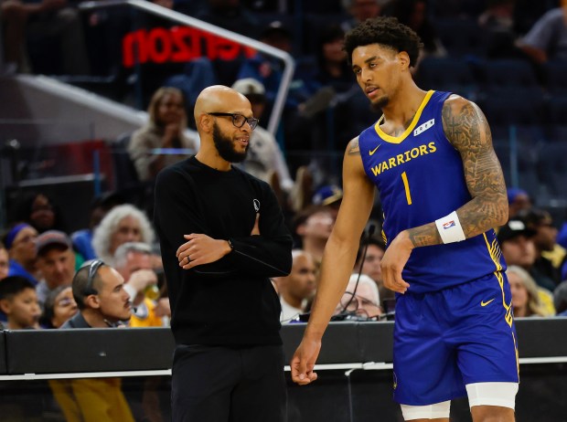 Golden State Warriors summer league coach Khalid Robinson talks to Golden State Warriors' Yaxel Lendeborg (1) in the second quarter during a Summer League game at Chase Center in San Francisco, Calif., on Friday, July 3, 2026. (Shae Hammond/Bay Area News Group)