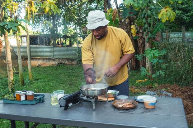Frazier's cookbook, "Cook Out," includes recipes for outdoor meals and recommended ingredients that can be prepared ahead of time at home. (Alex Forestier via AP)