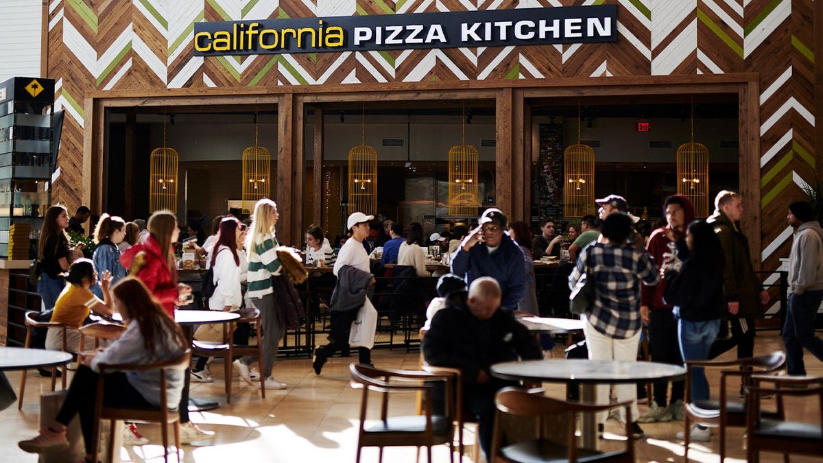 People eat at California Pizza Kitchen