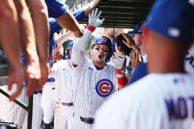 Cubs right fielder Seiya Suzuki celebrates after hitting a three-run home run against the Padres in the first inning at Wrigley Field on July 1, 2026. (Terrence Antonio James/Chicago Tribune)