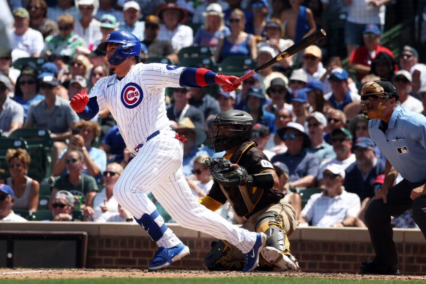 Cubs catcher Miguel Amaya watches his RBI single in the third inning against the Padres at Wrigley Field on July 1, 2026. (Terrence Antonio James/Chicago Tribune)