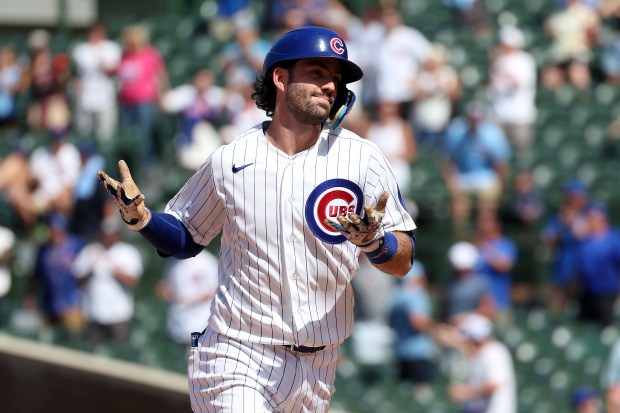 Cubs shortstop Dansby Swanson reacts after hitting a grand slam home run in the eighth inning against the Padres at Wrigley Field on July 1, 2026. (Terrence Antonio James/Chicago Tribune)