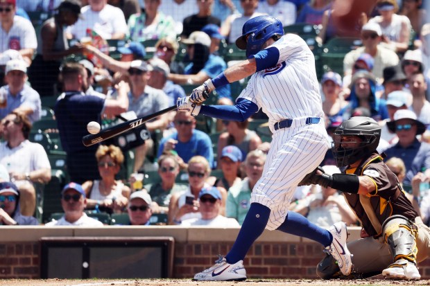 Cubs shortstop Dansby Swanson (7) hits a home run in the third inning against the Padres at Wrigley Field on July 1, 2026. (Terrence Antonio James/Chicago Tribune)