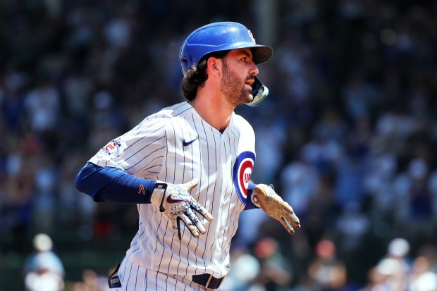 Cubs shortstop Dansby Swanson (7) rounds the bases after hitting a home run in the third inning against the Padres at Wrigley Field on July 1, 2026. (Terrence Antonio James/Chicago Tribune)