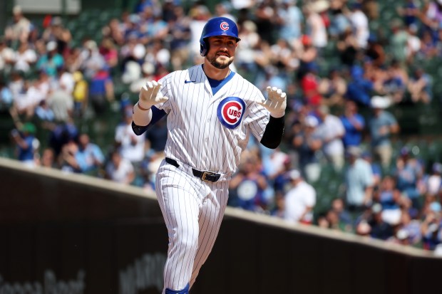 Cubs designated hitter Michael Conforto celebrates after hitting a home run against the Padres in the sixth inning at Wrigley Field on July 1, 2026. (Terrence Antonio James/Chicago Tribune)