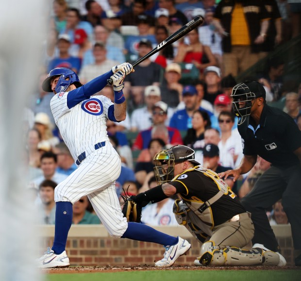 Chicago Cubs shortstop Dansby Swanson (7) hits a solo home run in the second inning of a game against the San Diego Padres at Wrigley Field in Chicago on June 30, 2026. (Chris Sweda/Chicago Tribune)