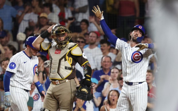 Chicago Cubs shortstop Dansby Swanson celebrates after crossing home plate following his two-run home run in the fifth inning of a game against the San Diego Padres at Wrigley Field in Chicago on June 30, 2026. (Chris Sweda/Chicago Tribune)