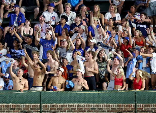 Fans cheer in the right field bleachers in the seventh inning of a game between the Chicago Cubs and the San Diego Padres at Wrigley Field in Chicago on June 30, 2026. (Chris Sweda/Chicago Tribune)