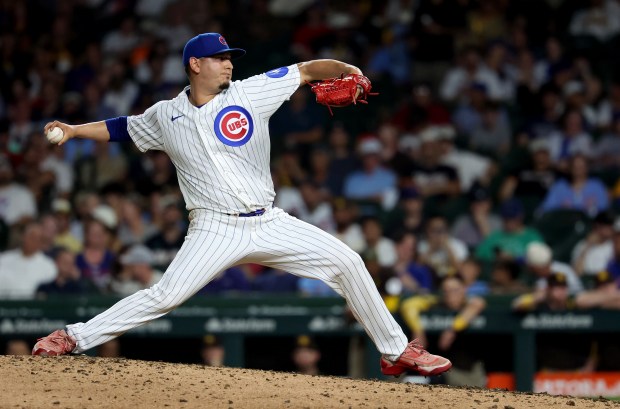 Chicago Cubs relief pitcher Javier Assad delivers to the San Diego Padres in the eighth inning of a game at Wrigley Field in Chicago on June 30, 2026. (Chris Sweda/Chicago Tribune)