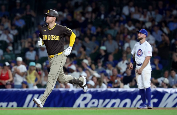 San Diego Padres player Gavin Sheets rounds the bases after hitting a three-run home run in the eighth inning of a game against the Chicago Cubs at Wrigley Field in Chicago on June 30, 2026. (Chris Sweda/Chicago Tribune)