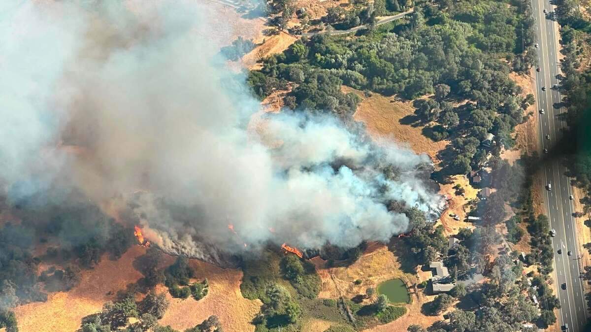The Combie Fire started on Tuesday afternoon near Lake of the Pines off Highway 49 in Nevada County, law enforcement and Cal Fire officials said. The Combie Fire started on Tuesday afternoon near Lake of the Pines off Highway 49 in Nevada County, law enforcement and Cal Fire officials said.