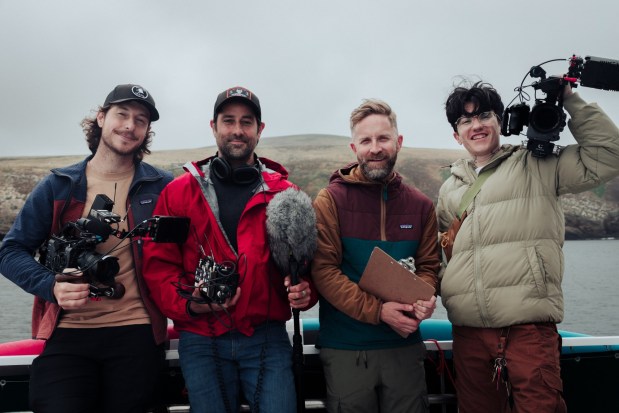 Filmmakers Elliott Kennerson (second from right) and Angel Morris (right) with crew during filming of the documentary. (Perfect Four Productions)