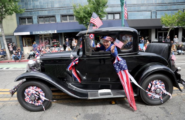 A vintage vehicle rolls by as the Alameda 4th of July Parade heads down Park Street in Alameda, Calif., on Saturday, July 4, 2026. (Jane Tyska/Bay Area News Group)