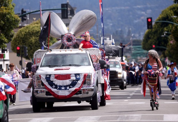 A float from Bay Ship & Yacht Company float carries a giant boat propeller as the Alameda 4th of July Parade heads down Park Street in Alameda, Calif., on Saturday, July 4, 2026. (Jane Tyska/Bay Area News Group)