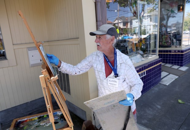 Artist Randall Stauss, of San Rafael, paints along Encinal Avenue during the Frank Bette Center for the Arts Plein Air Paint Out in Alameda, Calif., on Wednesday, July 29, 2026. (Jane Tyska/Bay Area News Group)