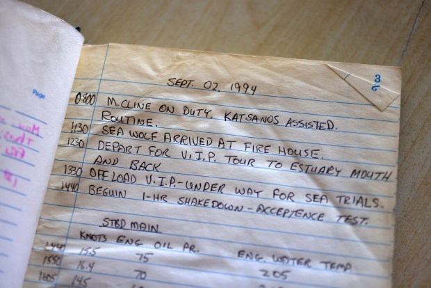 A log book notes the arrival of Oakland Fire Department boat "Sea Wolf" on Monday, July 27, 2026, in Oakland, Calif. The firefighting boat arrived in Oakland on Sept. 2, 1994, and was removed from service in 2003. (Aric Crabb/Bay Area News Group)