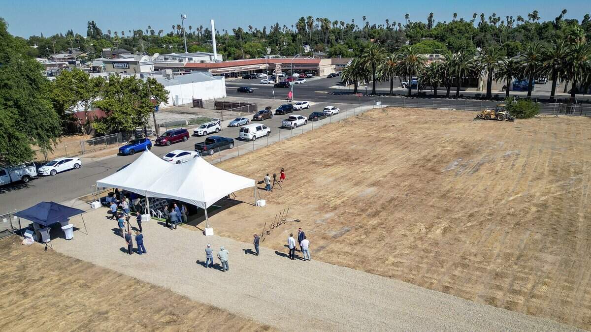 A tent stands where city officials held a groundbreaking ceremony to begin construction on an affordable apartment complex on a decades-long empty lot on Ventura Avenue east of downtown Fresno on Friday, July 24, 2026.
