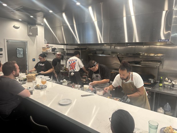 The kitchen staff at Bar Becky is hard at work on the restaurant's final night on Saturday, July 25. (Photo by Jo Murray, Grunion Gazette/SCNG)