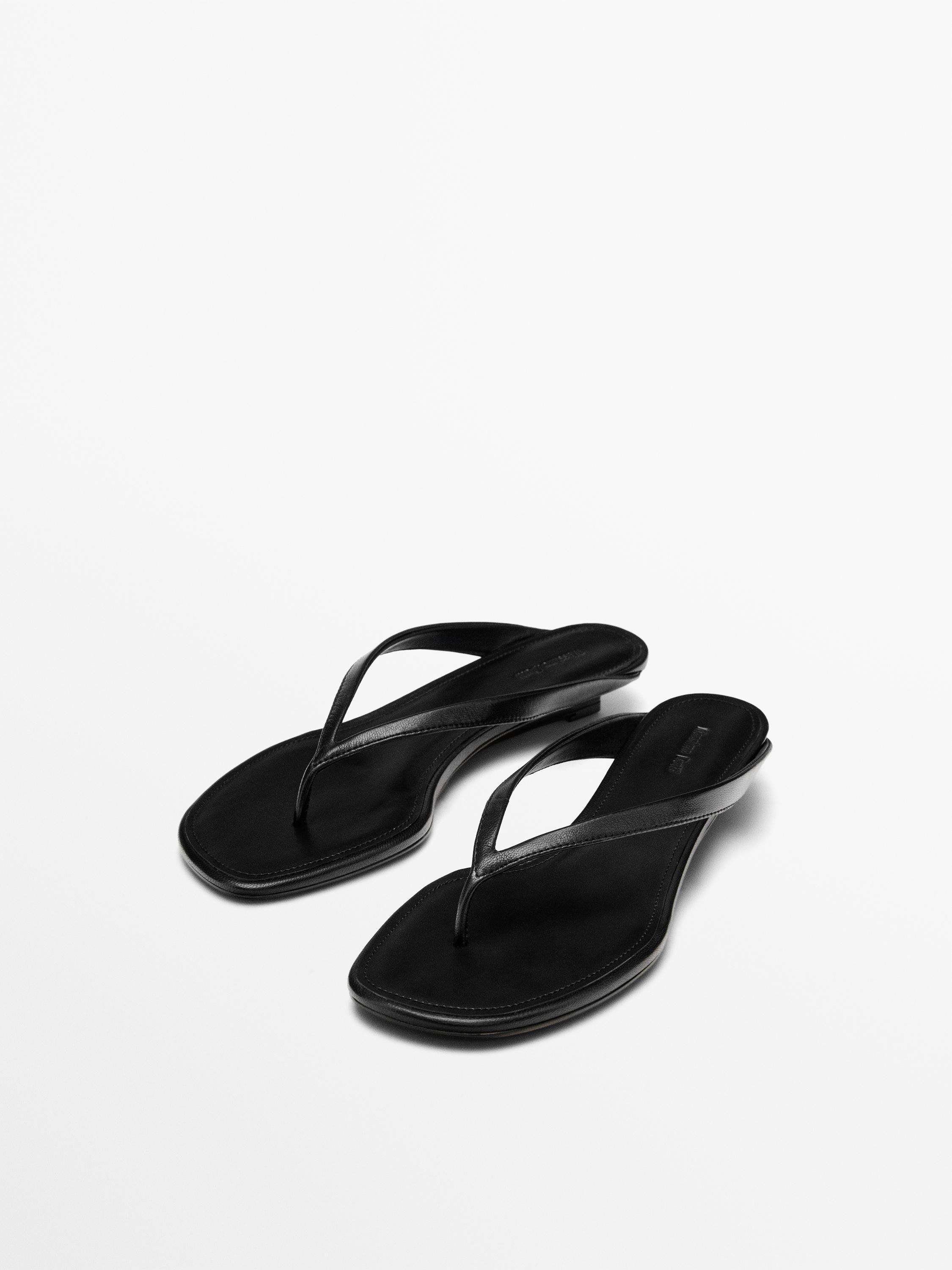 Black leather sandals
