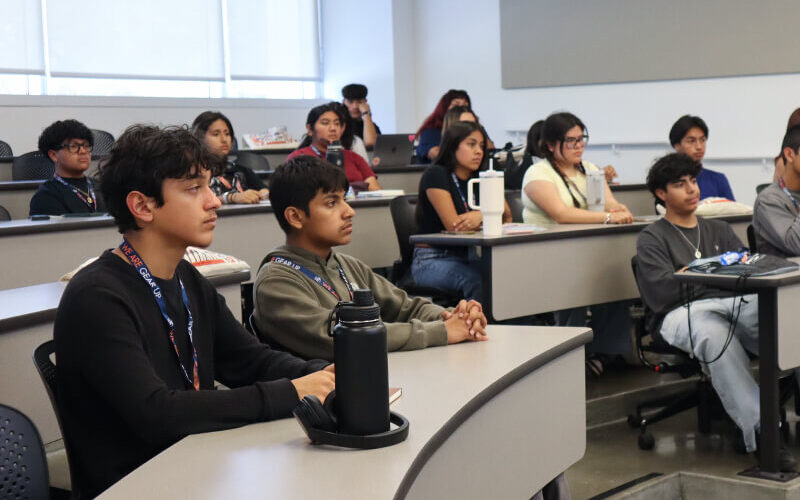 High school students attend a lecture taught by a CSUF faculty member.