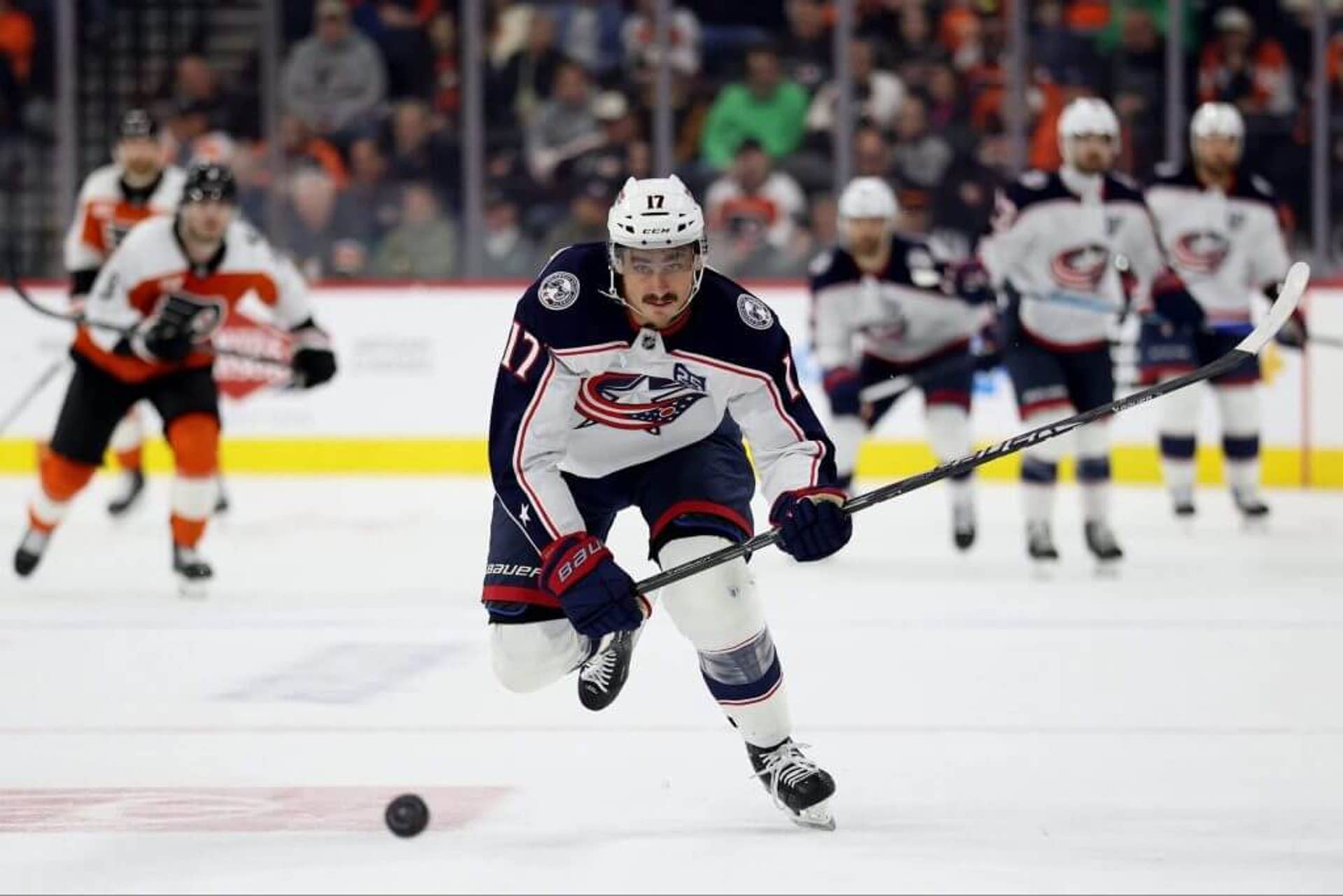 Mason Marchment of the Columbus Blue Jackets chases the puck during a game against the Philadelphia Flyers.
