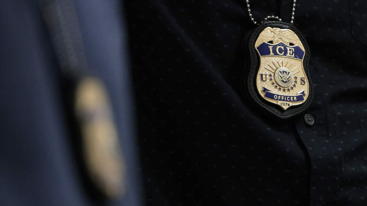 The badges of Immigration and Customs Enforcement (ICE) agents are seen as they patrol the halls of immigration court at the Ted Weiss Federal Building on May 12 in New York City. The badges of Immigration and Customs Enforcement (ICE) agents are seen as they patrol the halls of immigration court at the Ted Weiss Federal Building on May 12 in New York City.