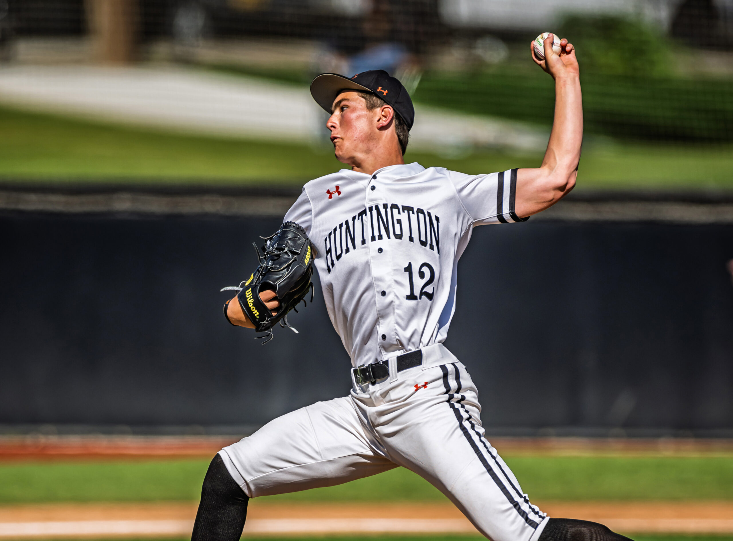 Jared Grindlinger pitching in a game for Huntington Beach High School against Marina High School