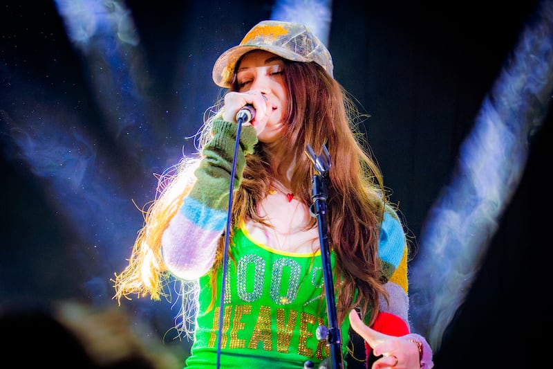 Person singing at a concert