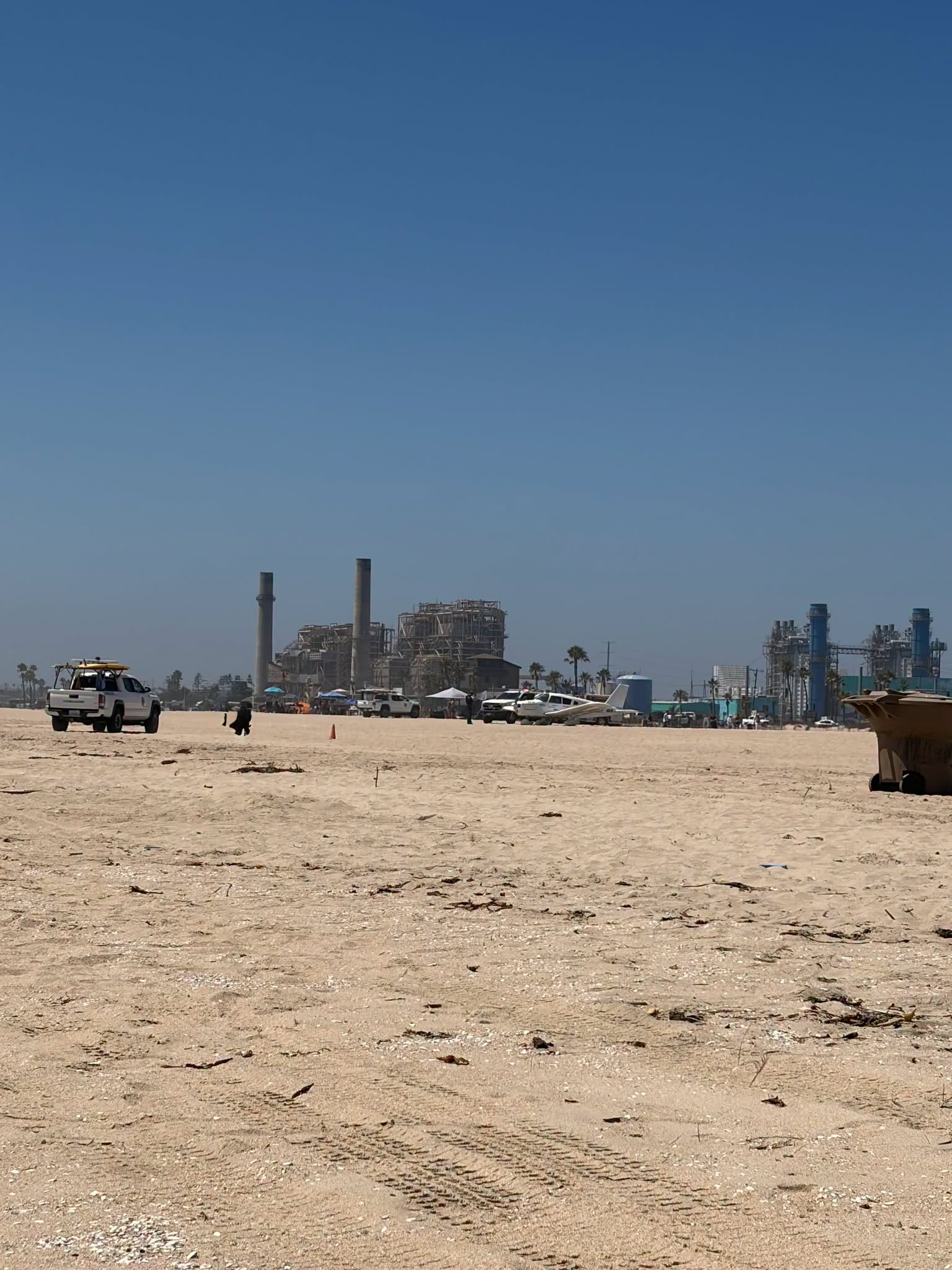 Photos from the scene showed the plane on the beach near a lifeguard tower