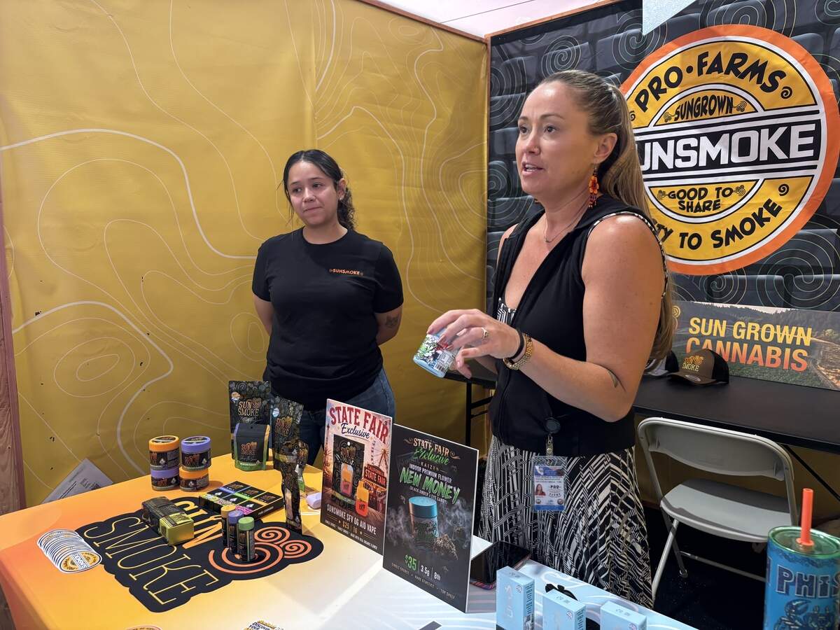 Mariah Prystupa and Sol Prado with Sun Smoke and Kaizen Extracts explain cannabis products to a customer at the California State Fair cannabis sale and consumption area on Saturday. “It’s about time, I love it, we need more of it,” Prystupa said about the State Fair’s embracing of the cannabis industry.