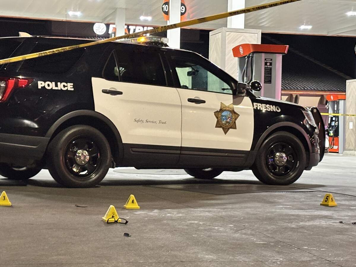 After a fight over a fuel pump at a packed gas station, one man was stabbed and produced a firearm, Fresno police said.