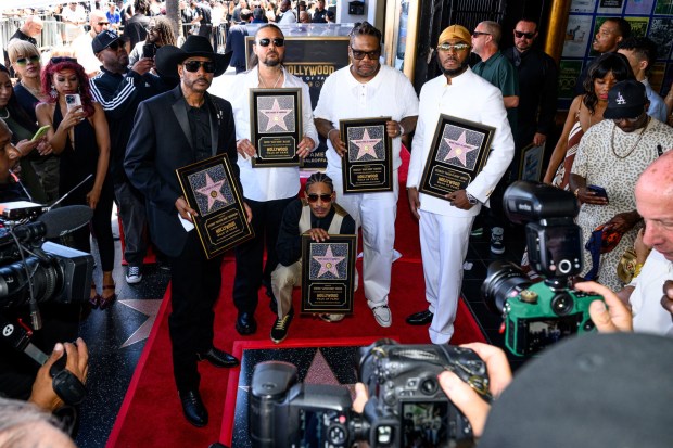 Hip hop group Bone Thugs-N-Harmony pose with their new star on the Hollywood Walk of Fame on Wednesday, July 8, 2026. (Photo by Jacob Lewis, Contributing Photographer)