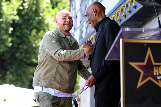 Rapper Fat Joe and radio host Big Boy shake hands at hip hop group Bone Thugs-N-Harmony's Hollywood Walk of Fame star ceremony on Wednesday, July 8, 2026. (Photo by Jacob Lewis, Contributing Photographer)
