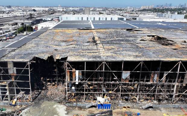 Cleanup efforts continue on Tuesday, July 7, 2026, at the Lineage Logistics cold-storage warehouse in Boyle Heights that was gutted by a fire.   (Photo by Dean Musgrove, Los Angeles Daily News/SCNG)