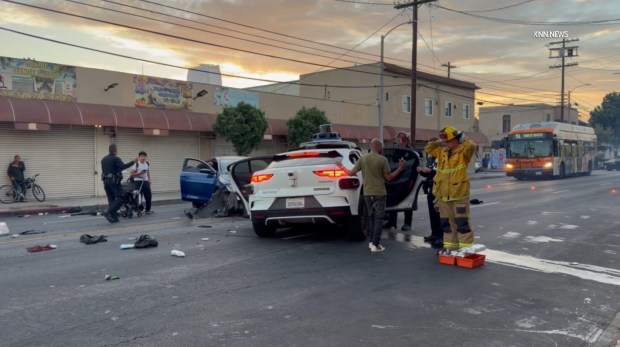 A crash involving a Waymo autonomous vehicle and another car on Sunday in Los Angeles' Pico-Union neighborhood sent two people to the hospital, according to a videographer's report from the scene. One of the patients was in critical condition. (Photo from video by Jose Gomez/Key News Network)