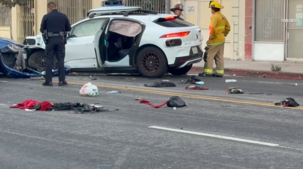 A crash involving a Waymo autonomous vehicle and another car on Sunday in Los Angeles' Pico-Union neighborhood sent two people to the hospital, according to a videographer's report from the scene. One of the patients was in critical condition. (Photo from video by Jose Gomez/Key News Network)